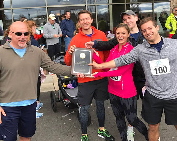 Photo of winners at charity run.